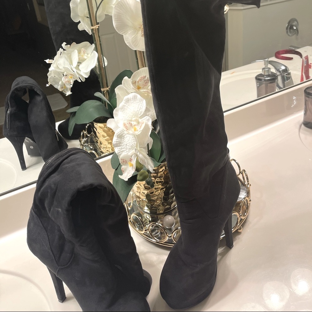 Black platform heeled boots